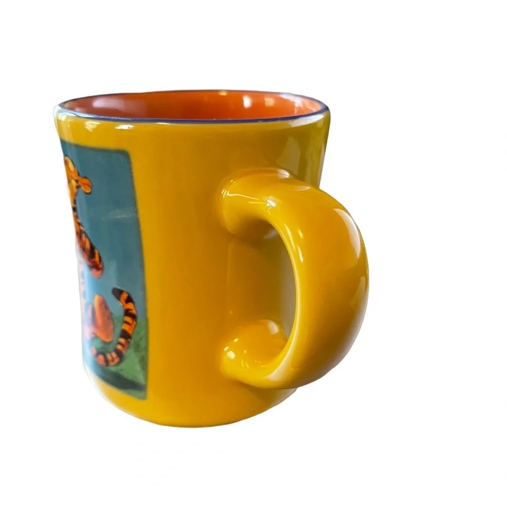 The Disney Store Tigger Mug in Yellow & Orange “Base‎ on Winnie the Pool”